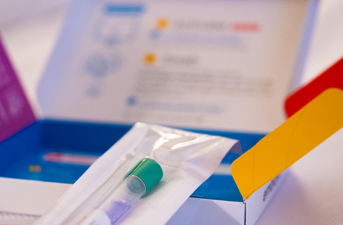 A photo of a home DNA testing kit tube.