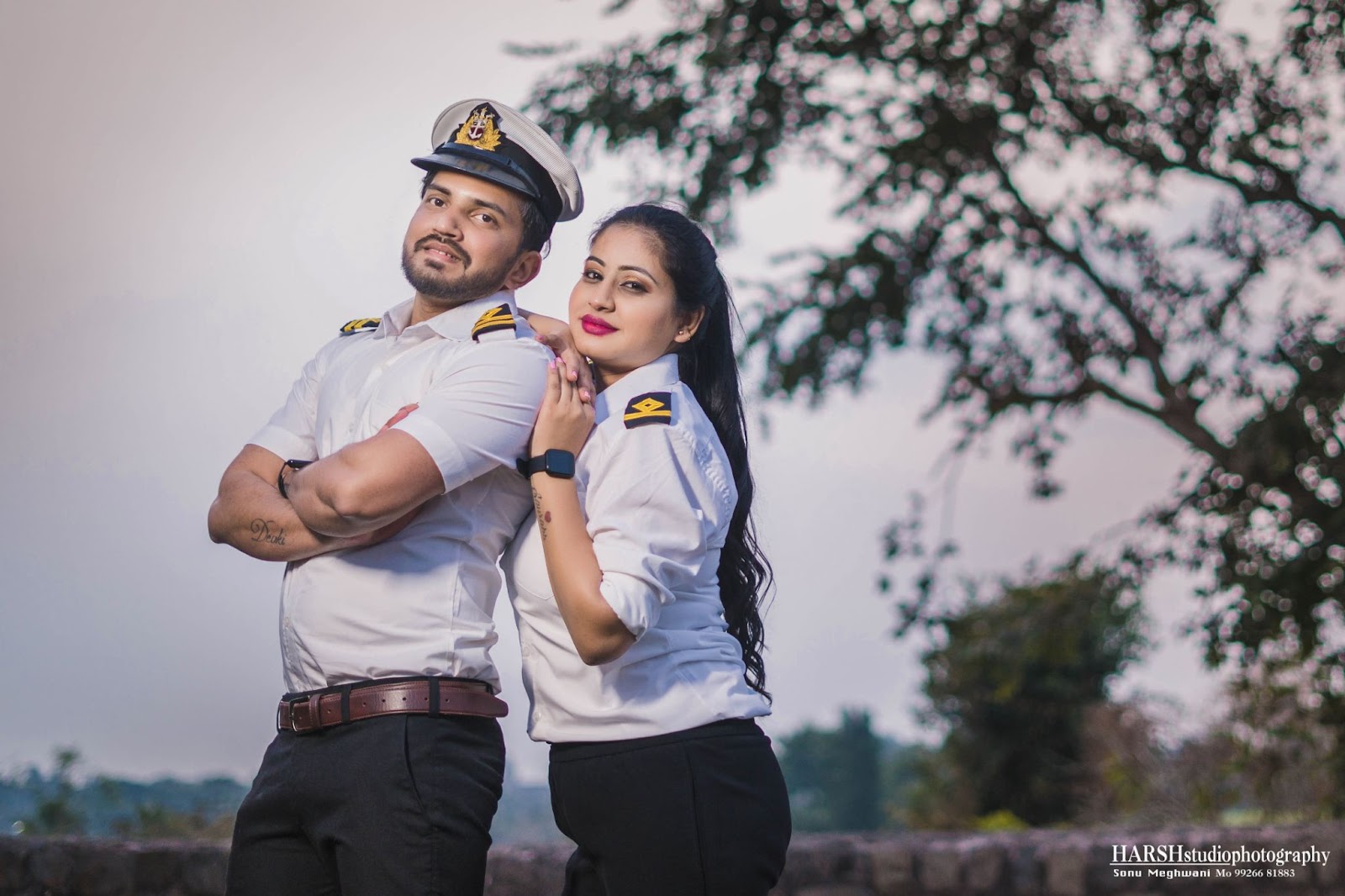 Pre-wedding shoot location in Mandu, near Indore, featuring a unique outfit of an Indian Navy officer bride and groom. Captured by Harsh Studio Photography, a leading wedding photographer in Indore, renowned for their exceptional services. Keywords targeted: Wedding photographer, Best wedding photographers, Wedding photography services, Professional wedding photographers, Wedding photographer near me, Affordable wedding photographers Indore, Top-rated wedding photographers, Wedding photographer availability Indore, Wedding photographer portfolio Indore, Wedding photographer rates in Indore. Harsh Studio Photography specializes in creating unique and memorable pre-wedding moments with creativity and expertise.