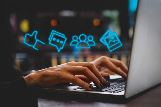 Hand of businesswoman using laptop with icon social media and social network. Online marketing concept Hand of businesswoman using laptop with icon social media and social network. Online marketing concept content marketing stock pictures, royalty-free photos & images