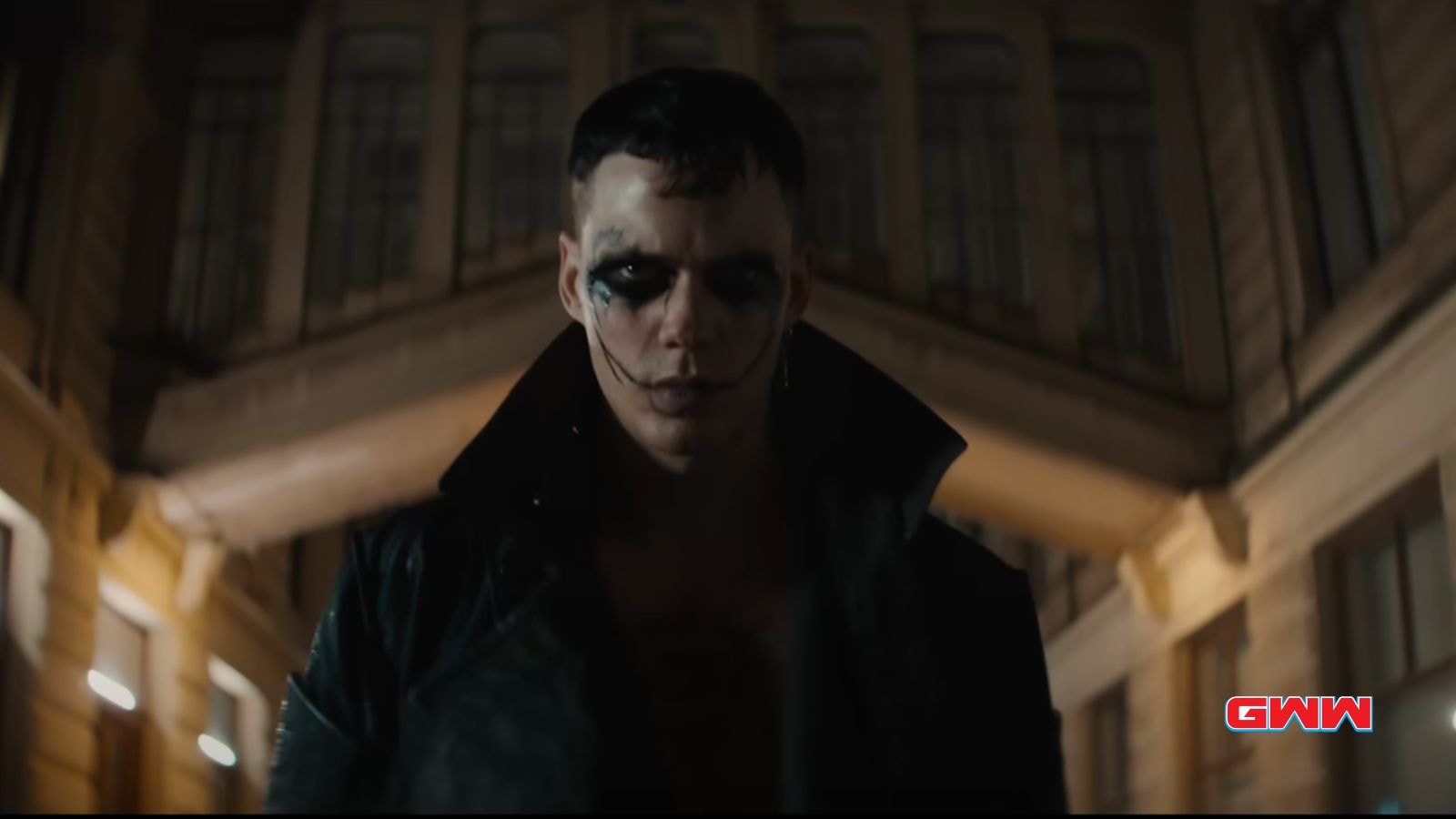 Eric with black paint around his eyes, looking determined in The Crow 2024 Trailer