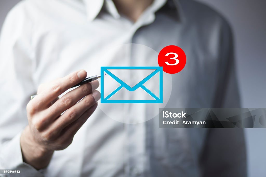 A man pointing at an email icon