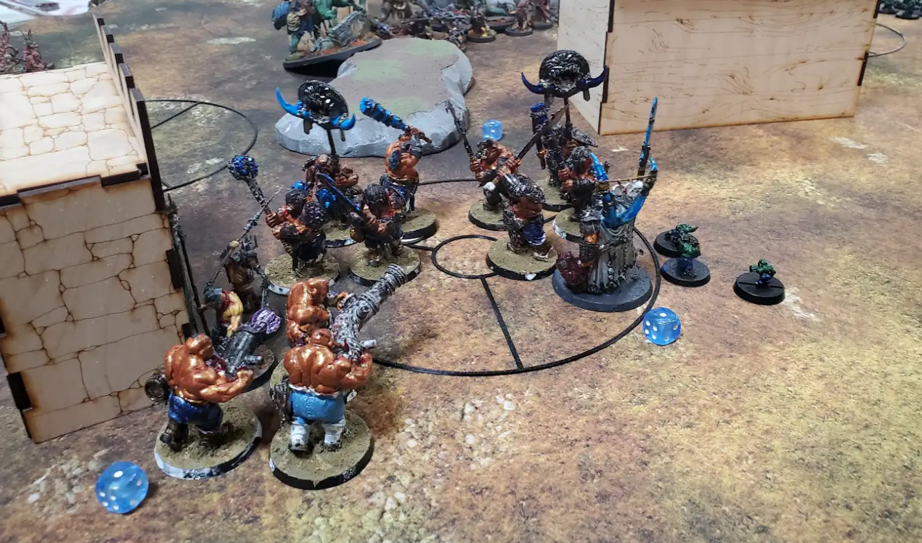 A group of figurines on a table  Description automatically generated