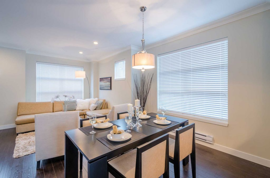 Venetian blinds in an open living space perfectly complementing the area with excellent light control and beauty