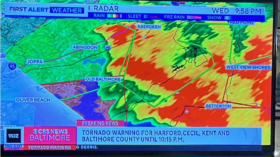 WJZ-TV Weather map showing TORNADO WARNING alert with red and yellow graphics showing rain amounts over the the areas of OLIVER BEACH, JOPPA, ABINGDON, OLD BALTIMORE, BETTERTON, and WEST VIEW SHORES