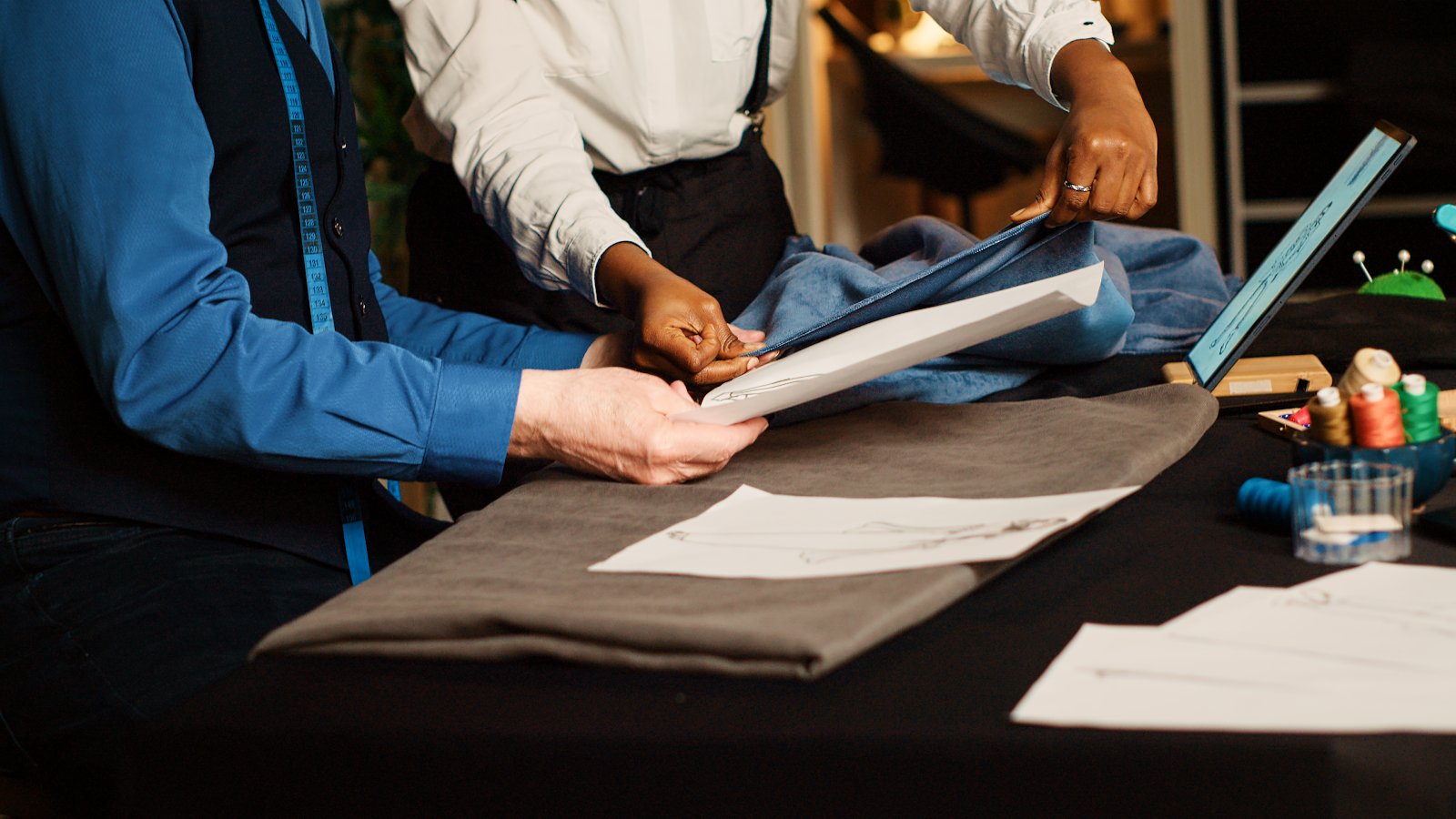 two coworkers looking at documents