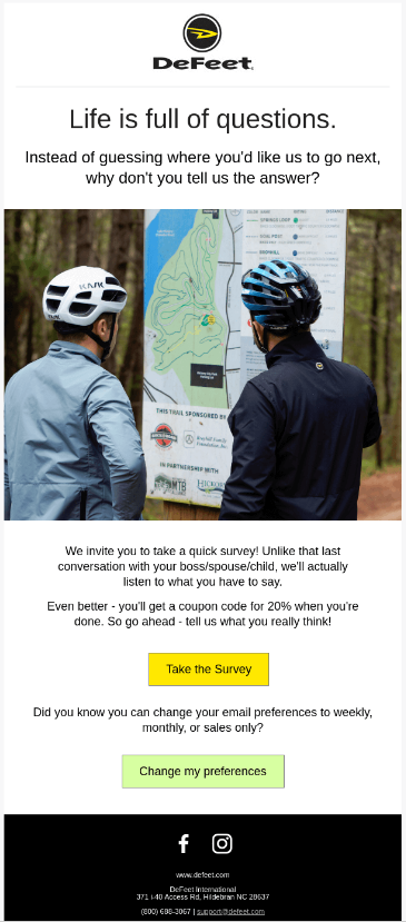 Two men wearing helmets looking at a map
Description automatically generated