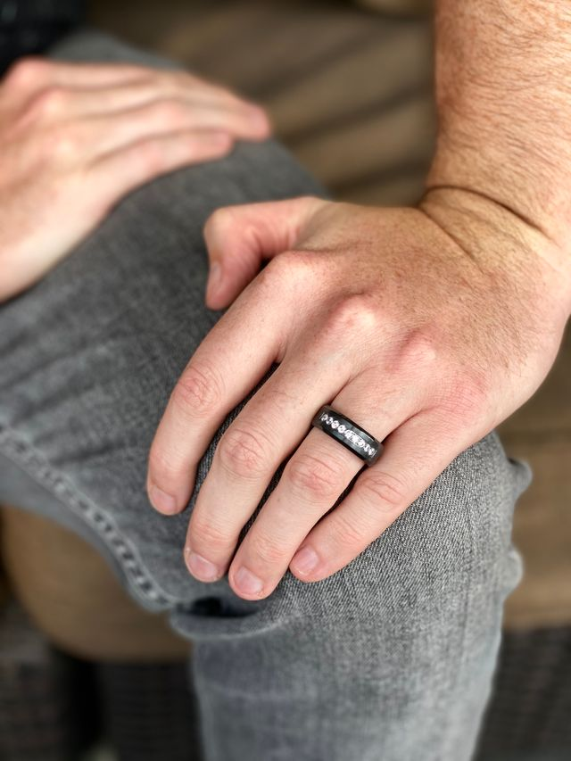 man wearing a luxury mens ring from John Atencio