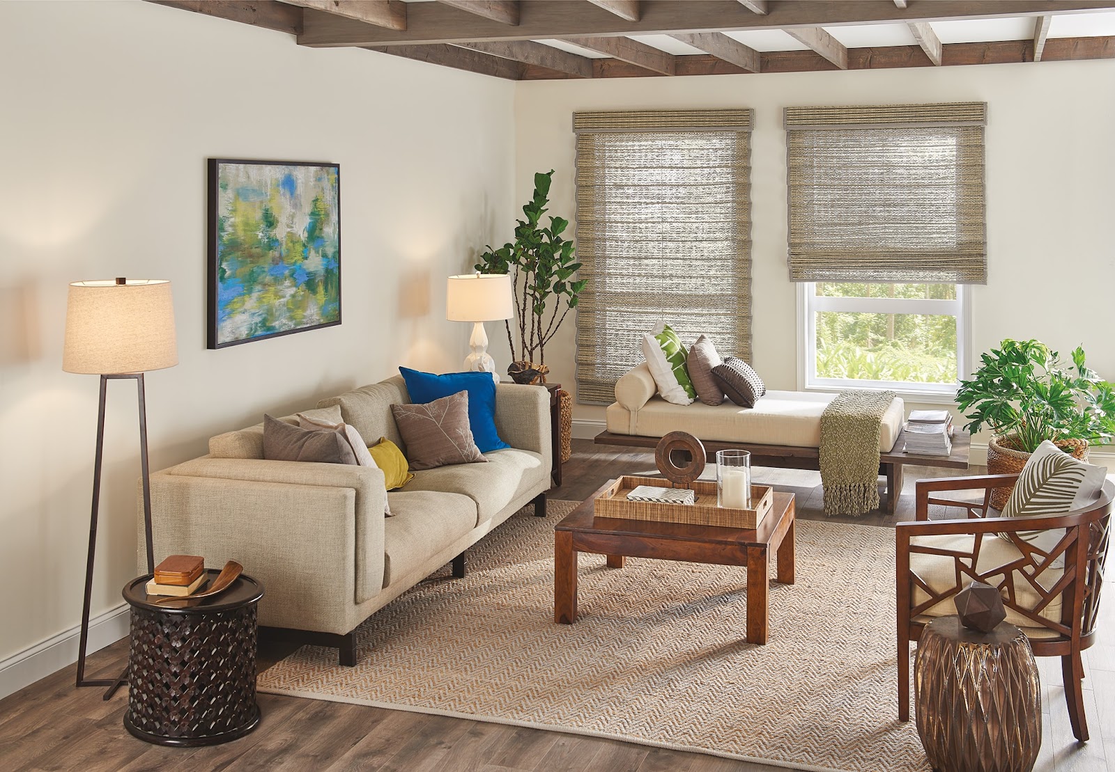 Living room area with woven window shadings in the background