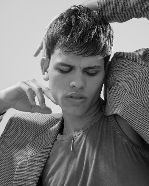 Picture of a man wearing the Messy Two Block Hairstyle for Men