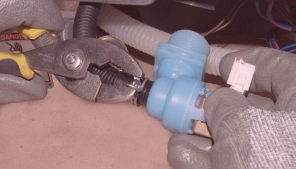 Debris and build-up around the inlet valve.