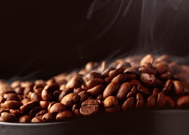 A bowl of coffee beans

Description automatically generated