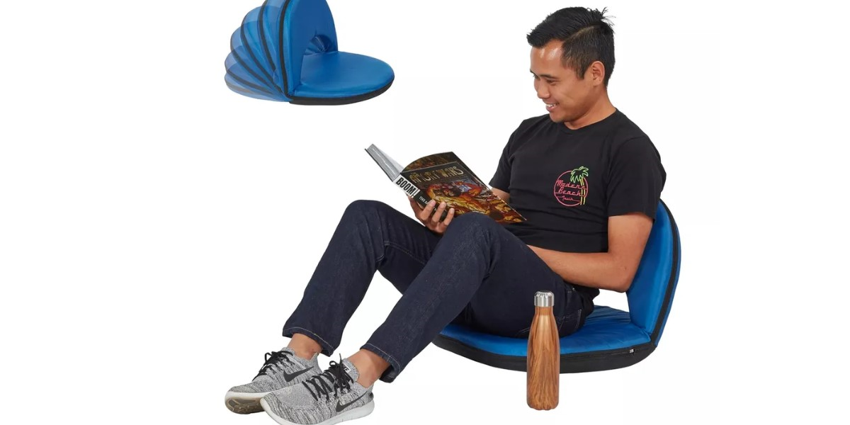 A man reading a book on adjustable Japanese meditation chair