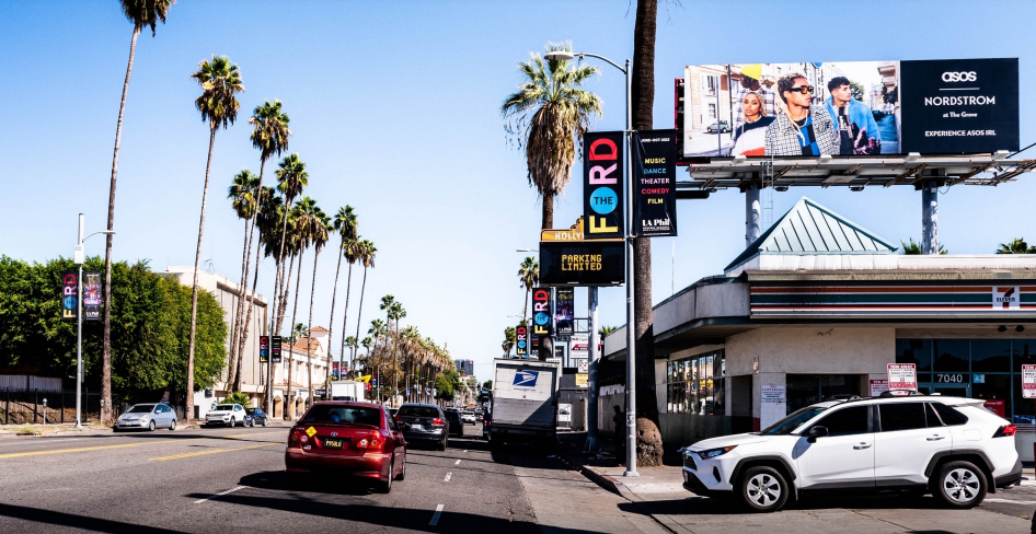 Static large-format billboard along Sunset Boulevard, Los Angeles, California