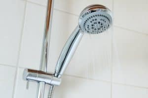 Use a shower to wash down your tiles and keep them soap-free