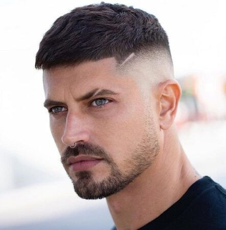 Picture of a guy wearing the high fade variation of the haircut