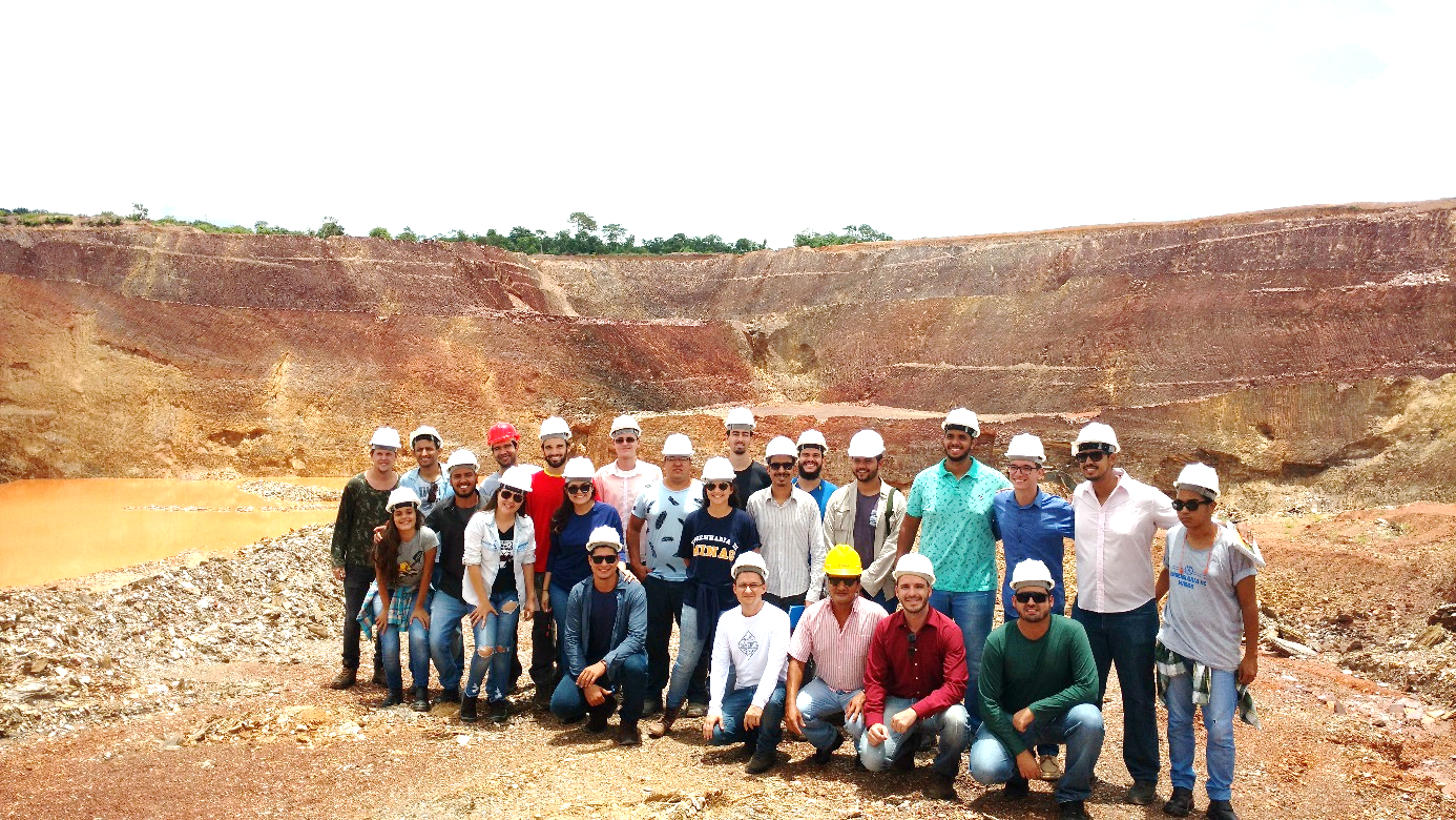 A group of people wearing hard hats

Description automatically generated