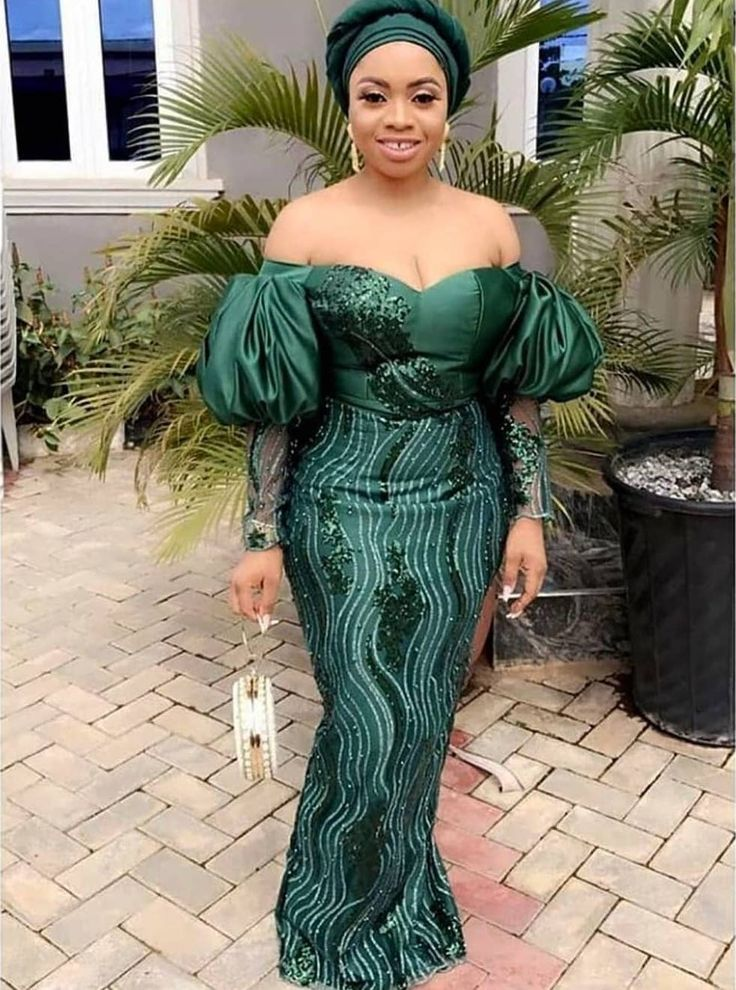 Another picture of a lady taking the Aso ebi fashion up a notch