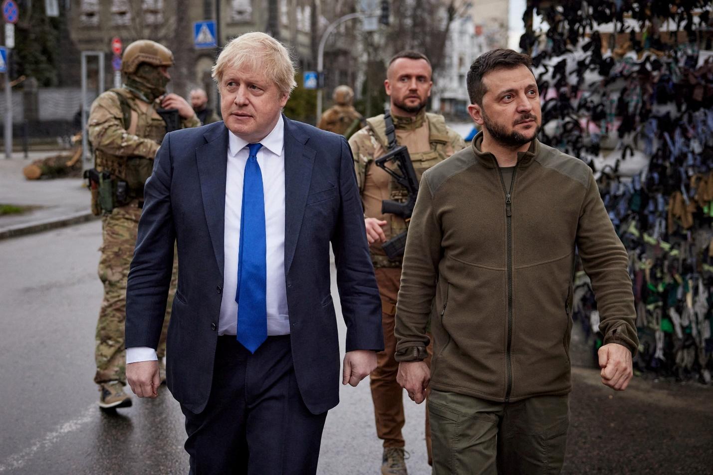 Ukraine's President Zelenskiy and British PM Johnson walk in central Kyiv