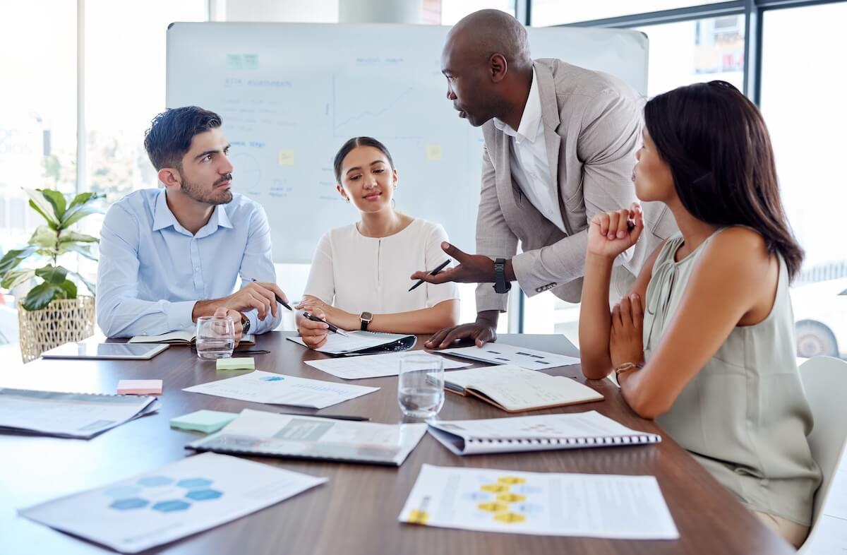 Business process analysis: team having a meeting