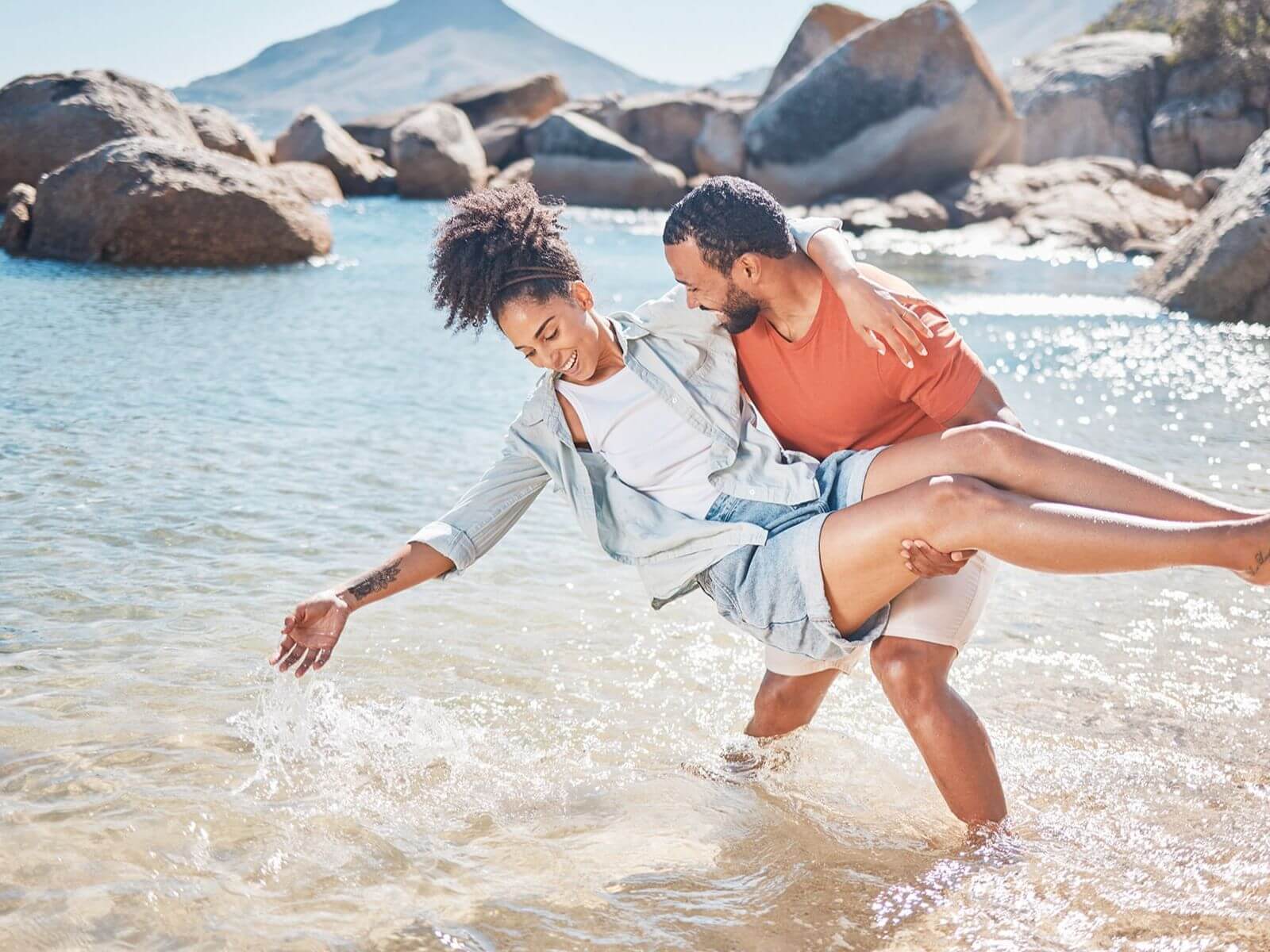 couple playing with water