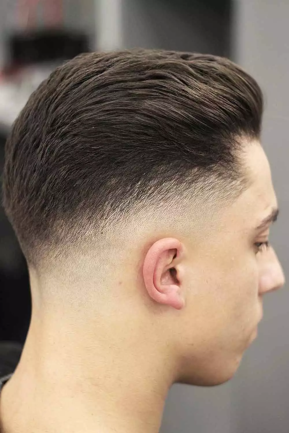 Picture of a guy rocking the drop skin fade