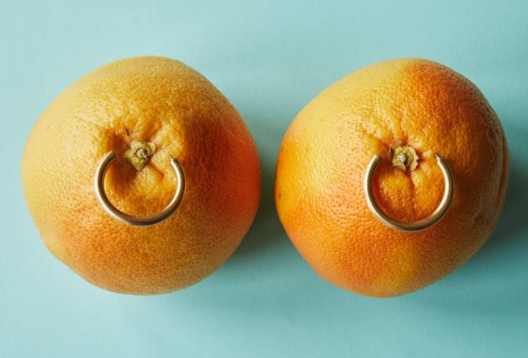 How can I breastfeed with nipple piercings?