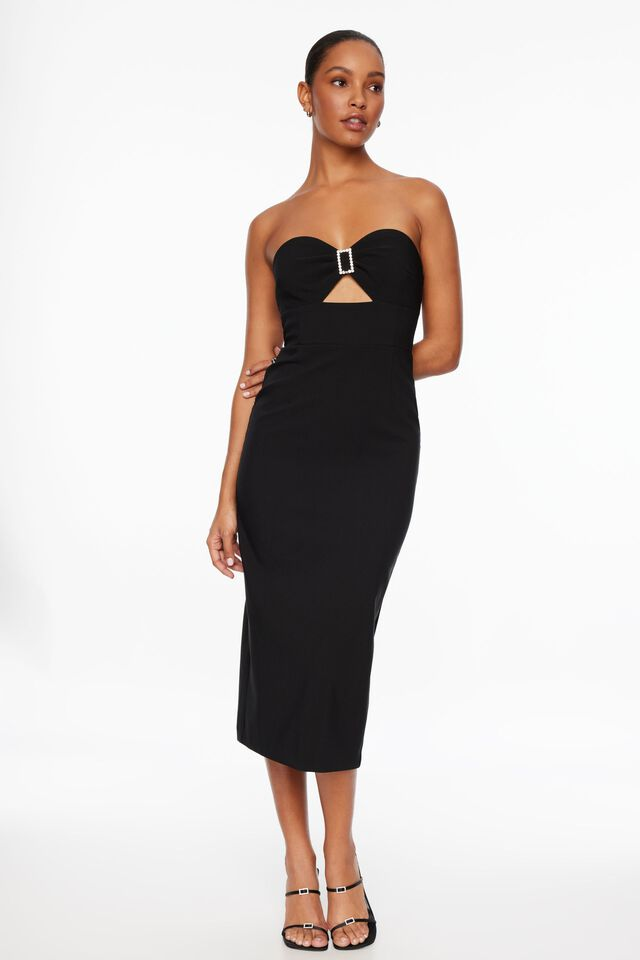 Elevate your style with this strapless midi dress designed to exude sophistication and accentuate your silhouette. Featuring a captivating rhinestone buckle appliqué, this dress boasts a sweetheart neckline and a cutout detail that adds allure to its form-fitting design. The inclusion of removable, adjustable spaghetti straps offers versatile styling options while the back zip closure ensures ease of wear. Crafted with a vented back for effortless movement, this dress is fully lined, combining comfort with elegance. Introducing the Cutout Rhinestone Buckle Midi Dress - a stunning ensemble that embodies grace and glamour.