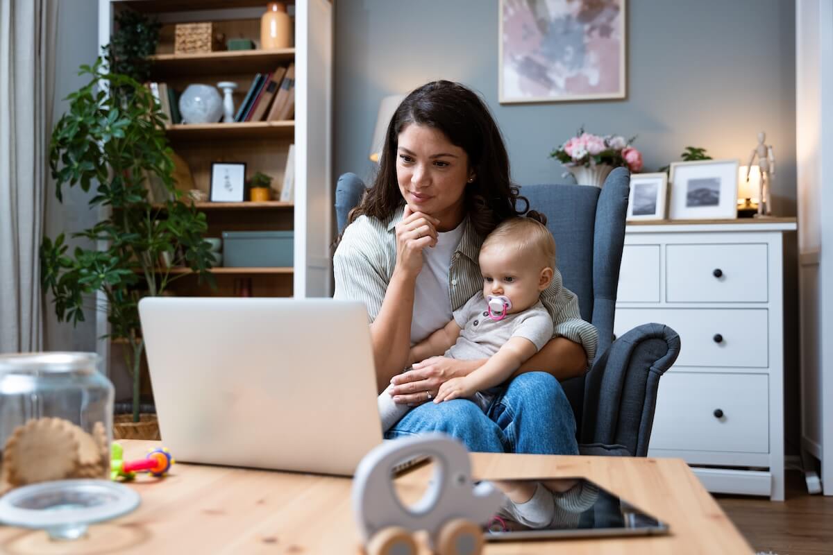 Manager taking care of her baby while working