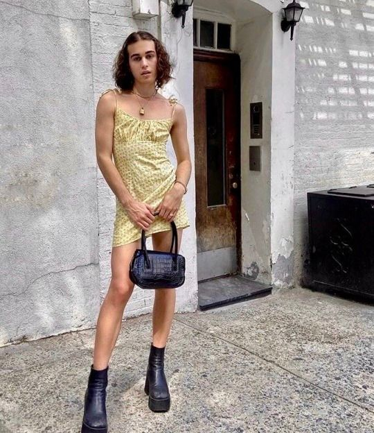Picture of a guy rocking a short dress with the Rick Owens boots 