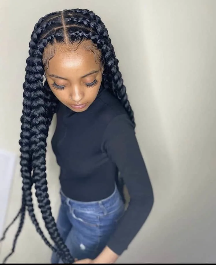 Full picture of a girl rocking the braids in an extra large way