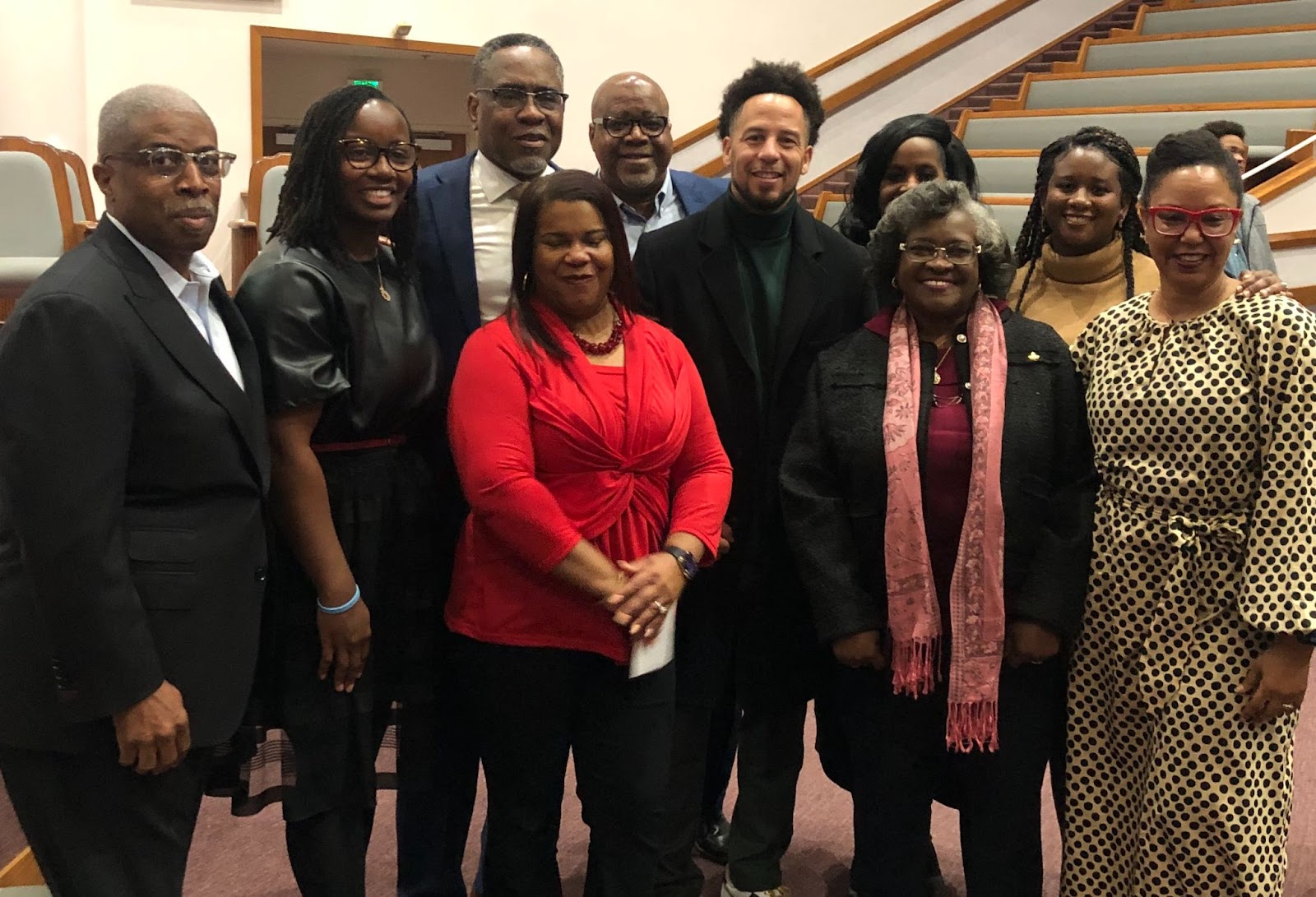From left: Saint Paul Executive Pastor Lamont Harris; Dr. Tatiana Grant, who graduated from Sacramento State; Saint Paul Pastor Kenneth R. Reece; first lady Lisa Reece; Roy Mathews, a Sac State graduate; Sac State President Dr. Luke Wood; Dr. Marcellene Watson-Derbigny, Sac State associate vice president for student retention and academic success (partially obscured); Sac State graduate Felicia Bessent; 2023 Sac State graduate Carmesha Grayson; and Dr. Colette Harris-Mathews.