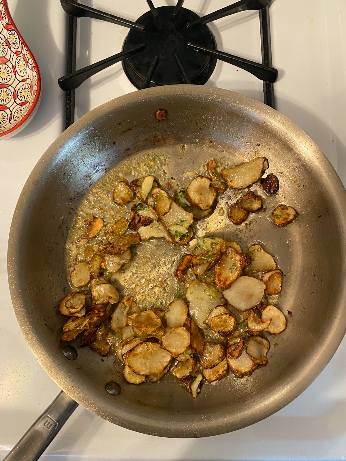 made in stainless steel pan cooking sunchokes