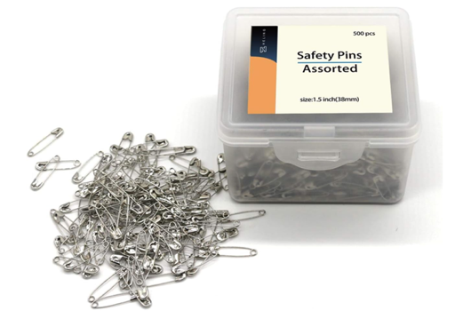A container of safety pins Description automatically generated