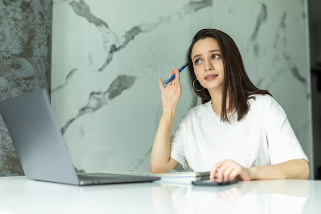 A girl thinking about some ideas to start work