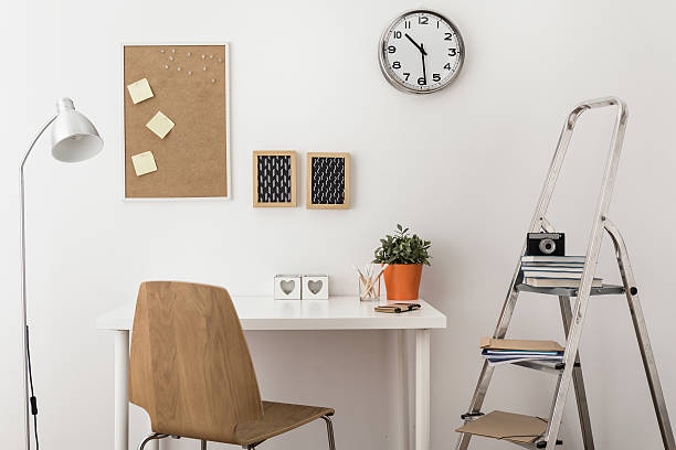 office table with decorative corkboard wall