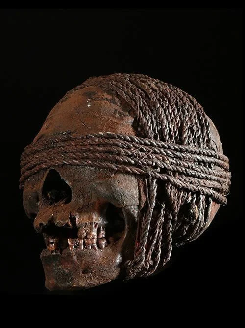 Was the discovery of a tethered head a punishment or a sacred act in the ropes of history