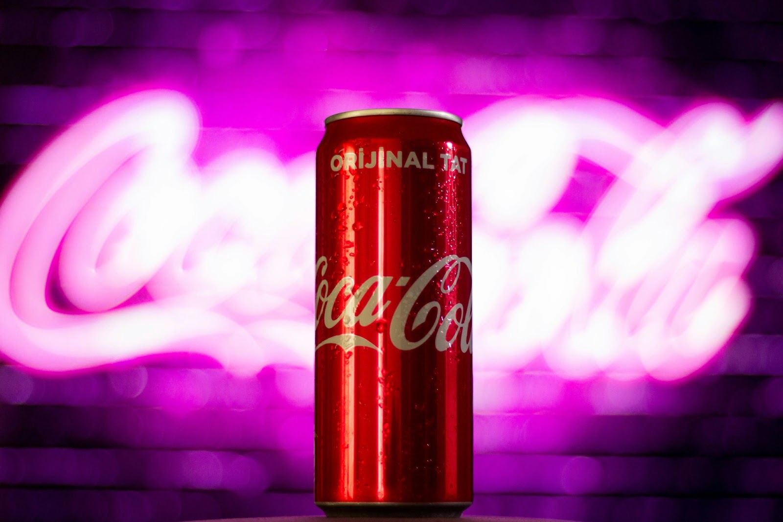 Coca-cola can in the Coca-cola neon light signage