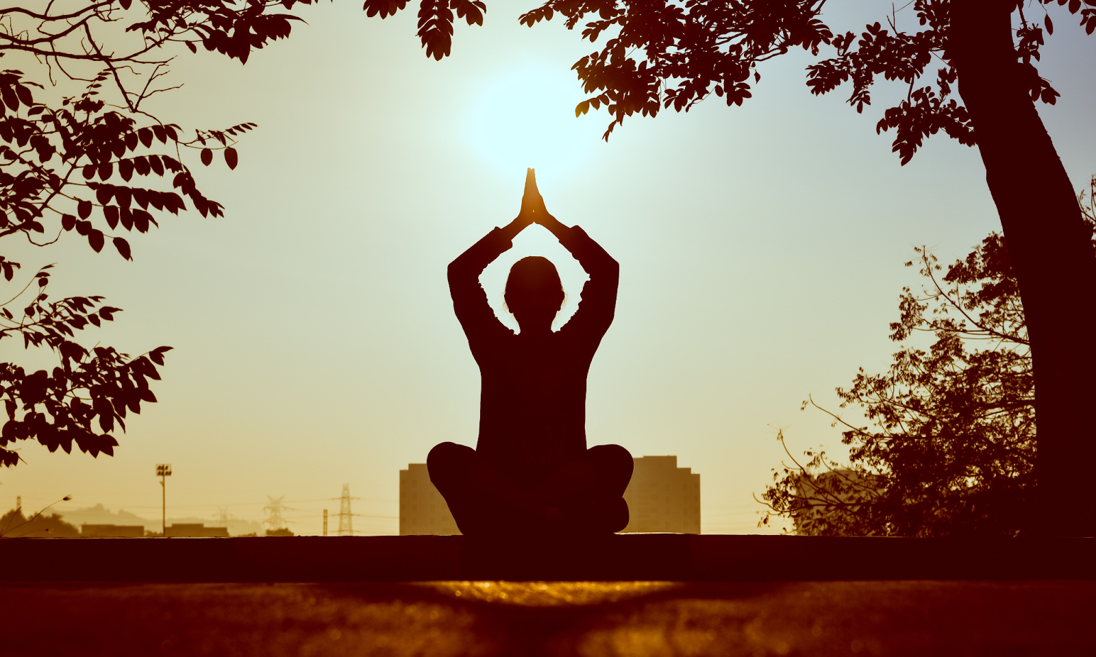 Women performing yoga to improve her spiritual journey 