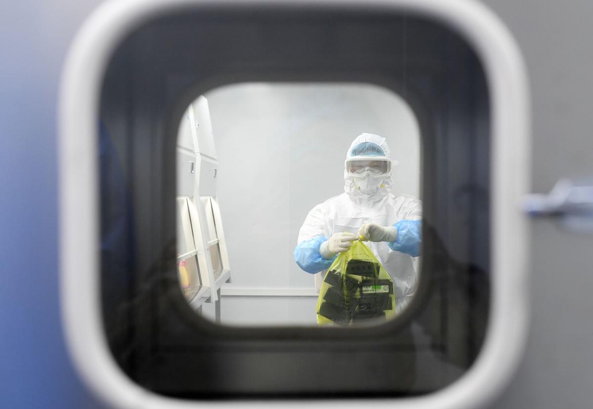 High safety standards: An employee of a biotech laboratory in Wuhan.
