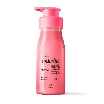 A pink bottle with a dispenser

Description automatically generated