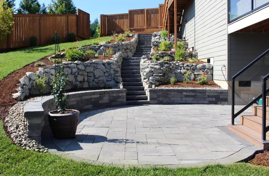 Hardscaping- Hardscaping refers to any of the non-living elements in your landscape.