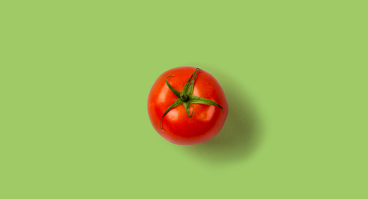 a tomato on flat background
