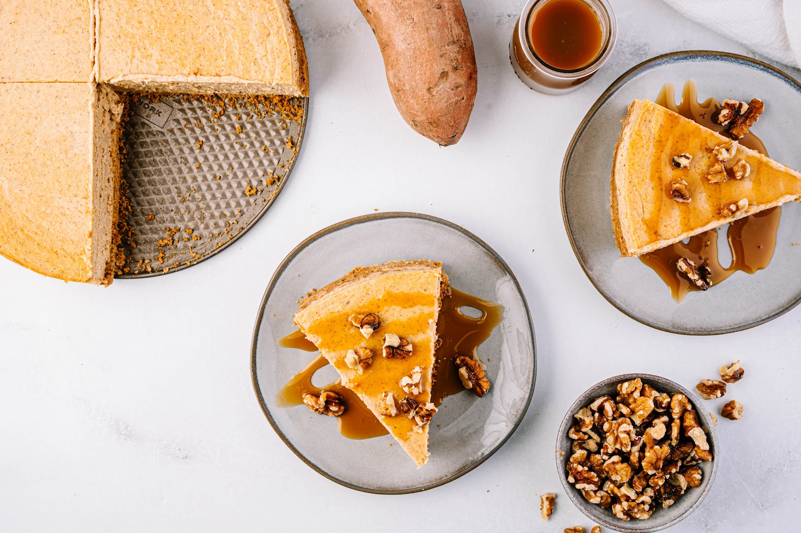 Sweet potato cheesecake slices served on a plate.