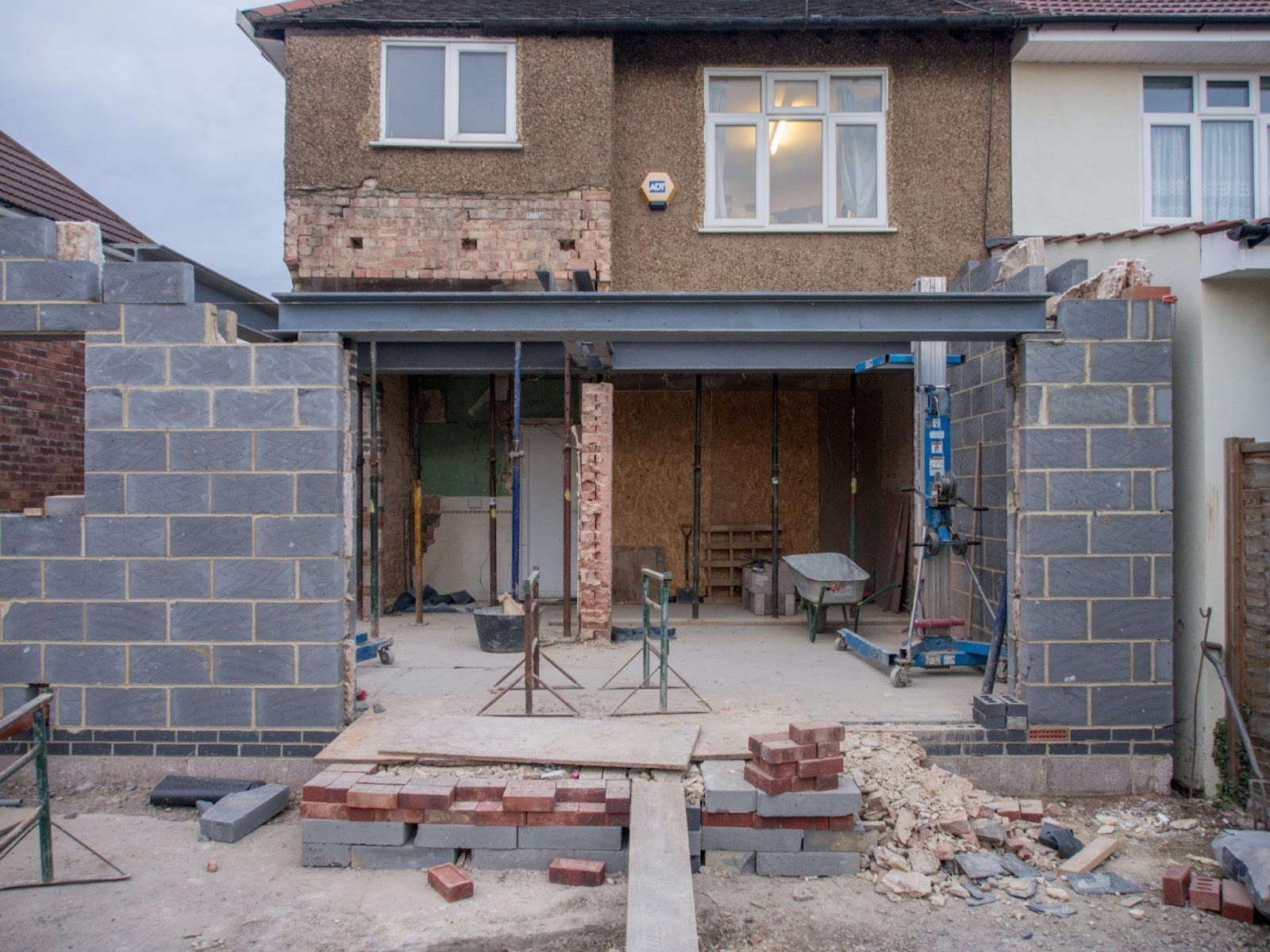 a brick house being built