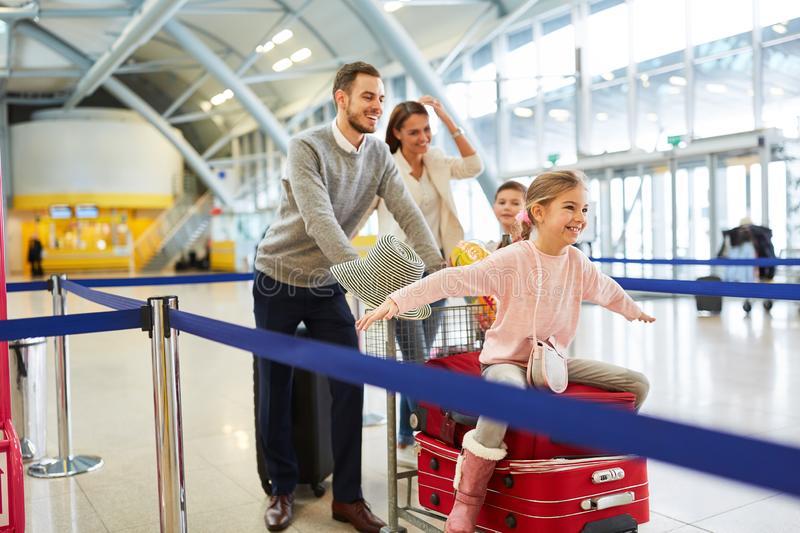 Family and Two Kids Have Fun in the Airport Stock Image - Image of  siblings, tourism: 158830083