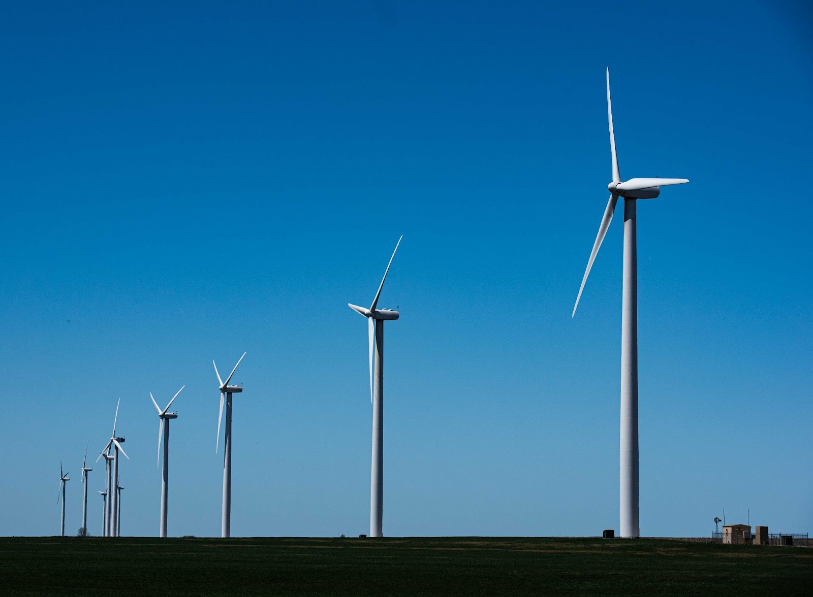 Photo of a line of wind turbines 