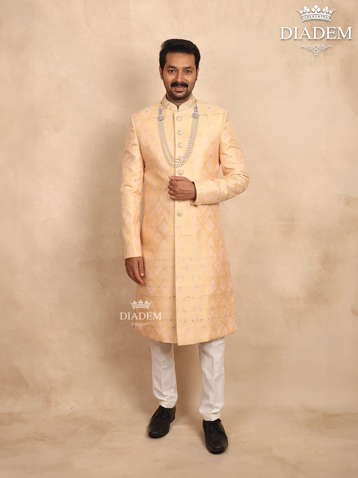 Sandal Jacquard Sherwani Suit Adorned with Embossed Details, Paired with Bead Mala