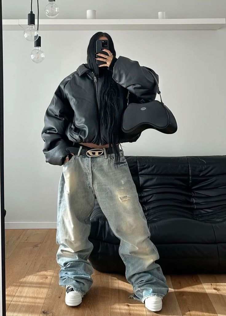 Picture of a fashionista rocking the pants with a bomber jacket