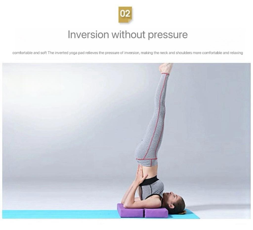 A person doing yoga on a mat

Description automatically generated