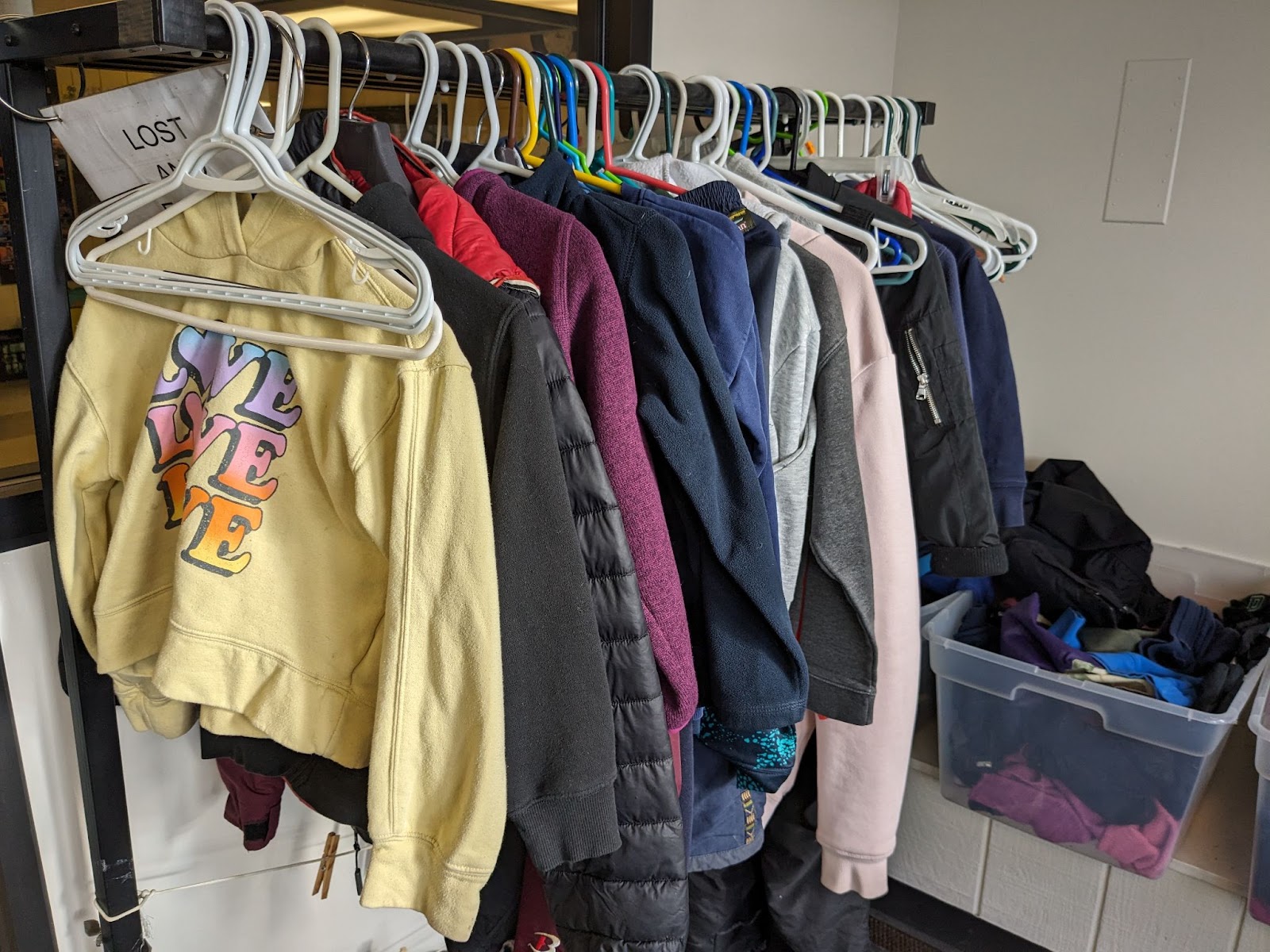 Image of items in lost and found, jackets, and hoodies